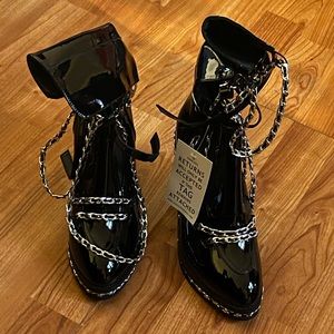 Jessica Buurman chain embellished boots